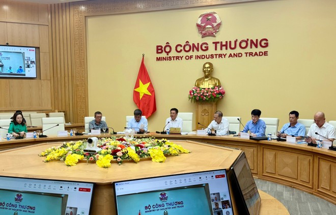 Panorama de la conférence sur la promotion de la production et des exportations de riz, ainsi que la stabilisation du marché du riz. Photo: VietnamPlus img-2369.jpg
