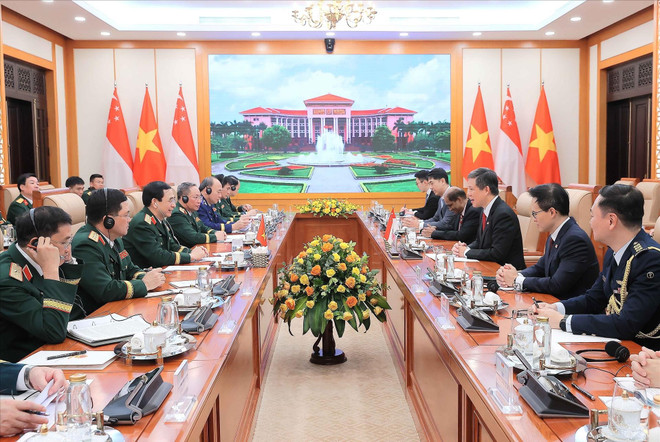 Panorama de l'entretien. Photo: VNA vna-potal-bo-truong-quoc-phong-singapore-tham-chinh-thuc-viet-nam-816332222-10-20-45.jpg