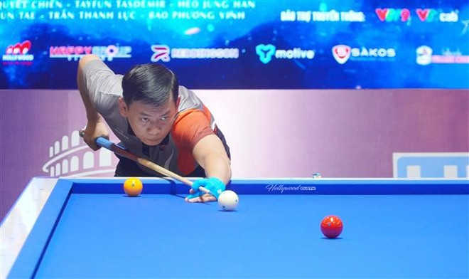 Le joueur Truong Huynh Quôc Dat. Photo: VNA vna-potal-khoi-tranh-giai-billiards-carom-3-bang-quoc-te-sctv-cup-2025-8055741.jpg