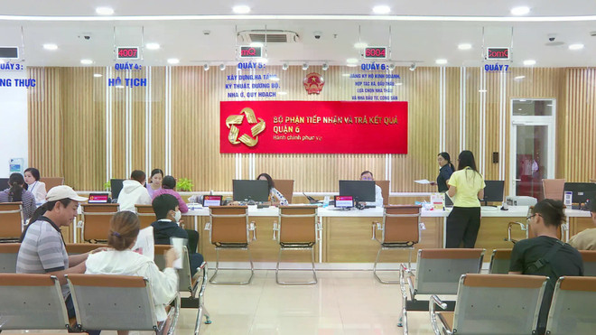 Traitement des procédures administratives à Hô Chi Minh-Ville. Photo: htv.com.vn z6187161033551-3e8f2017b8510975d7a017935b84f5e7-11zon.jpg