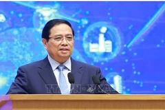 Le Premier ministre Pham Minh Chinh prend la parole, soulignant l’orientation fondée sur l’esprit des « cinq pionniers, cinq “avoir” et cinq “ne pas” ». Photo : VNA