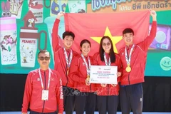 Le quatuor composé de Nguyen Huy Hoang, Vo Thi My Tien, Nguyen Kha Nhi et Mai Tran Tuan Anh. Photo : VNA