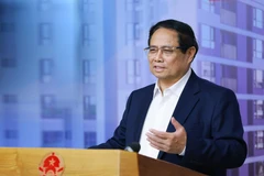 Le Premier ministre Pham Minh Chinh prend la parole à la conférence. Photo : VNA