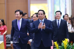 Le Premier ministre Pham Minh Chinh a présidé une rencontre afin de présenter ses vœux de Nouvel An et d'ordonner le déploiement immédiat des missions du Bureau du gouvernement. Photo : VNA