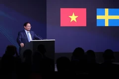 Le Premier ministre Pham Minh Chinh prend la parole lors du Forum d’affaires Vietnam – Suède sur le thème « Transition verte, transformation numérique, innovation » à Hanoï. Photo : VNA