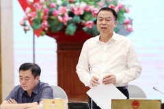 Le vice-ministre des Finances, Nguyen Duc Chi, s'exprime lors de la conférence de presse. Photo : VNA