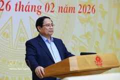 Le Premier ministre Pham Minh Chinh préside la 6ᵉ réunion du Comité directeur central chargé des politiques du logement et du marché immobilier. Photo : VNA