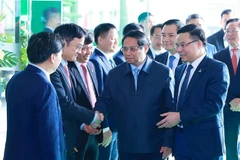 Le Premier ministre Pham Minh Chinh a assisté le 28 décembre à la conférence de bilan du Groupe national du pétrole et du gaz du Vietnam (Petrovietnam). Photo : VNA