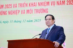 Le Premier ministre Pham Minh Chinh prend la parole à la conférence de bilan des activités de 2025 et de la période 2021-2025 et de déploiement des missions pour 2026 du secteur de l’agriculture et de l’environnement. Photo : VNA