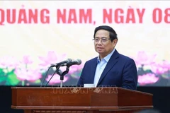 Le Premier ministre Pham Minh Chinh travaille avec les dirigeants de Quang Nam. Photo : VNA