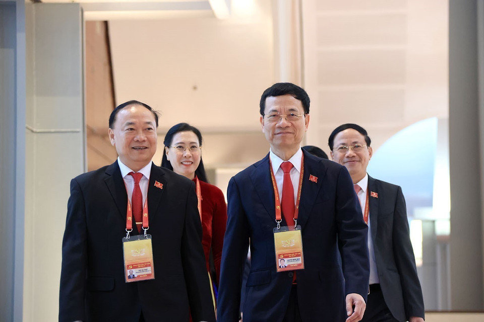 Les délégués arrivent à la séance d’ouverture du 14ᵉ Congrès national du Parti. Photo : VNA