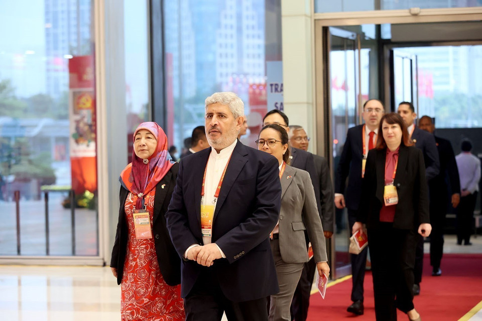 Les délégués internationaux présents à la séance d’ouverture. Photo: VNA