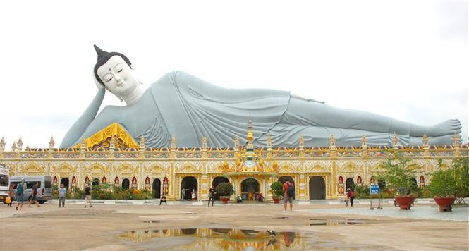 La pagode est réputée pour abriter la plus grande statue de Bouddha couché du Vietnam. Photo: VNA