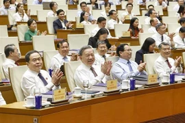 Le secrétaire général Tô Lâm, le Premier ministre Pham Minh Chinh et le président de l’Assemblée nationale Trân Thanh Mân à cet événement. Photo : VNA
