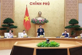 Le Premier ministre Pham Minh Chinh préside la deuxième réunion gouvernementale de septembre consacrée à l’élaboration des lois. Photo : VNA