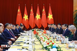 La rencontre entre le Premier ministre Pham Minh Chinh et le secrétaire général du Parti communiste chinois Xi Jinping, le 14 avril 2025 . Photo : VNA