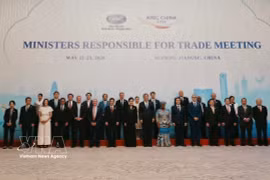 Délégués à la réunion des ministres du Commerce de l'APEC à Jiangsu, en Chine. Photo : VNA