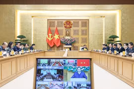 Le Premier ministre Phạm Minh Chính a présidé, le 7 janvier, une conférence en ligne pour évaluer la mise en œuvre de la « Campagne Quang Trung ». Photo : VNA