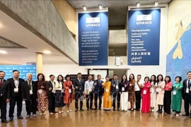 Les délégués vietnamiens participent à la 47e session du Comité du patrimoine mondial. Photo : VNA