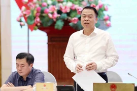 Le vice-ministre des Finances, Nguyen Duc Chi, s'exprime lors de la conférence de presse. Photo : VNA