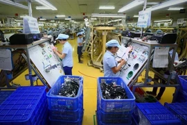 Fabrication de composants électroniques. Photo d'illustration : VNA