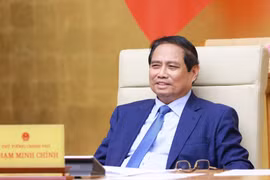 Le Premier ministre Phạm Minh Chính préside une réunion du gouvernement sur l'état de la décentralisation, de la répartition de pouvoir et de compétences liées au modèle d’organisation administrative à deux niveaux. Photo : VNA