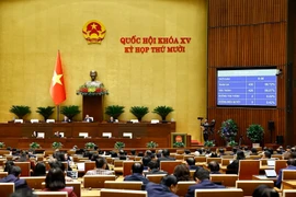 Les députés adoptent la Loi sur sur l’extradition. Photo : VNA