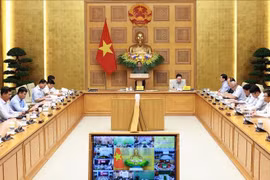 Le Premier ministre Pham Minh Chinh préside la 15ᵉ réunion du Comité national de lutte contre la pêche illégale, non déclarée et non réglementée (INN), tenue en ligne le 30 septembre. Photo : VNA