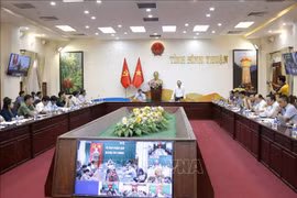 Séance de travail entre le Comité populaire de Binh Thuan et la délégation du ministère de l'Agriculture et du Développement rural. Photo: VNA