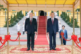 Le président To Lam et son homologue russe Vladimir Poutine. Photo: VNA