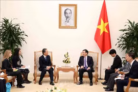 Le vice-PM Vuong Dinh Hue reçoit le président de la société japonaise de services financiers AEON