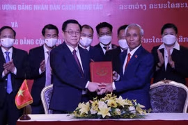 Le Vietnam et le Laos renforcent leur coopération dans la sensibilisation auprès des masses 