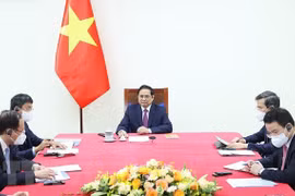 Le PM Pham Minh Chinh s’entretient au téléphone avec le président fondateur du WEF
