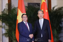 Le PM Pham Minh Chinh rencontre un haut dirigeant chinois