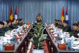 Le secrétaire général et président lao apprécie la coopération en défense Vietnam-Laos