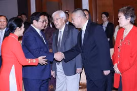 Le Premier ministre Pham Minh Chinh rencontre des personnalités chinoises de l'amitié