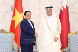le Premier ministre vietnamien Pham Minh Chinh et son homologue qatarien, Cheikh Mohammed ben Abderrahmane Al Thani.Photo : VNA