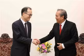Le vice-PM Truong Hoa Binh reçoit le procureur général de la R. de Corée ​