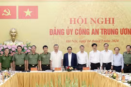 Le président To Lam, le Premier ministre Pham Minh Chinh et d'autres délégués lors de la conférence. Photo: VNA