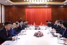 Pham Binh Minh rencontre ses homologues chinois et lao 