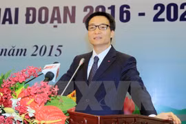 Le vice-Premier ministre Vu Duc Dam s'adresse lors de la visioconférence organisée le 21 janvier à Hanoi. Photo: VNA