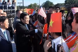 Le président Truong Tân Sang (droite) et la secrétaire américaine au Commerce, Penny Pritzker. (Source: VNA)