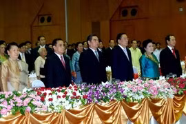 Des dirigeants vietmiens et laotiens au meeting (Photo: Hoang Chuong/Vietnam+)