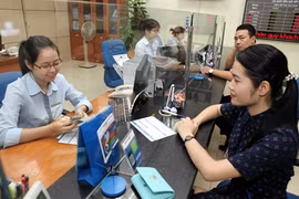 Fin mai, le volume de devises transférées à Hô Chi Minh-Ville s’élevait à 1,6 milliard. Photo : Trân Viêt/VNA