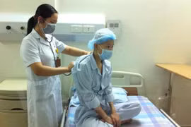 Le patient Hoàng Thi Thuy Linh. (Photo: T.G/Vietnam+)
