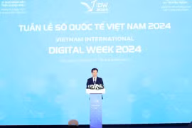 Le ministre de l'Information et de la Communication, Nguyên Manh Hung, s'exprime lorsd e l'ouvreture de la Semaine numérique internationale du Vietnam 2024. Photo: VietnamPlus 