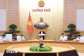 Le Premier ministre Pham Minh Chinh lors de la réunion du gouvernement, le 5 août. Photo : VNA
