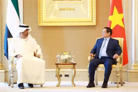 Le Premier ministre Pham Minh Chinh (à droite) et le ministre émirati de l'Industrie et des Technologies avancées et PDG de Abu Dhabi National Oil Company (ADNOC) Sultan bin Ahmed Al-Jaber. Photo: VNA