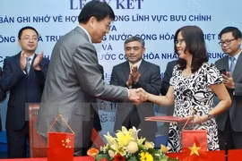 Vietnam-Chine : renforcement de la coopération dans le secteur postal 
