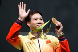 Hoang Xuan Vinh remporte la première médaille d'or aux JO pour le Vietnam